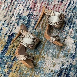 Bebe high heel snakeskin print mules